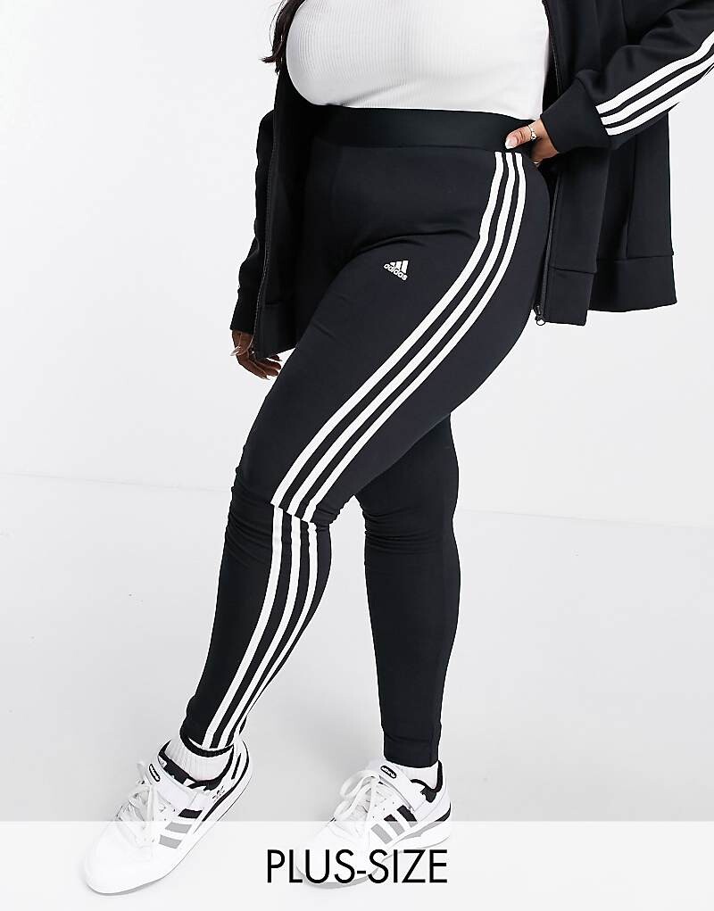 

Черные леггинсы с 3 полосками adidas Sportswear Plus Essential
