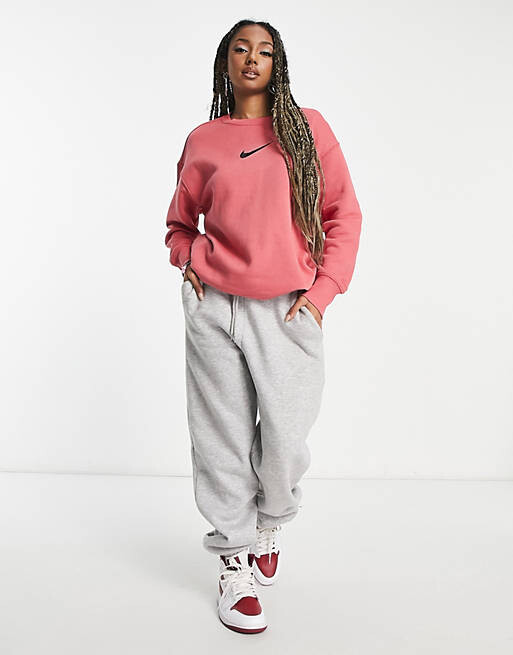 

Розовый свитшот Nike Midi Swoosh