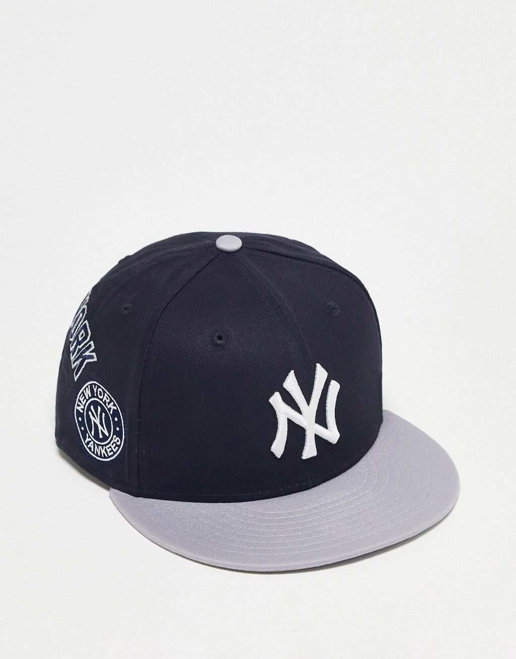 

Темно-синяя кепка с нашивкой New Era 9Fifty New York Yankees