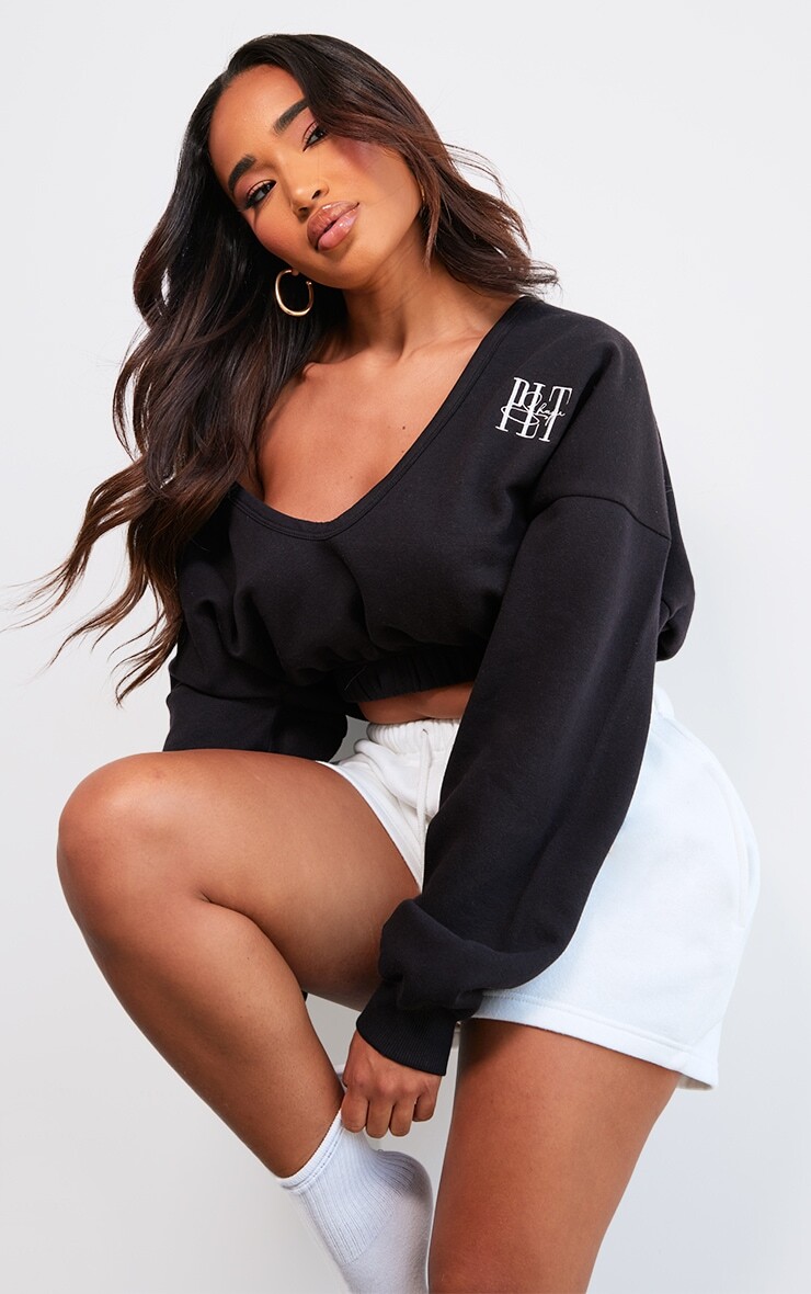 

PrettyLittleThing Shape Черный укороченный свитер с вышивкой