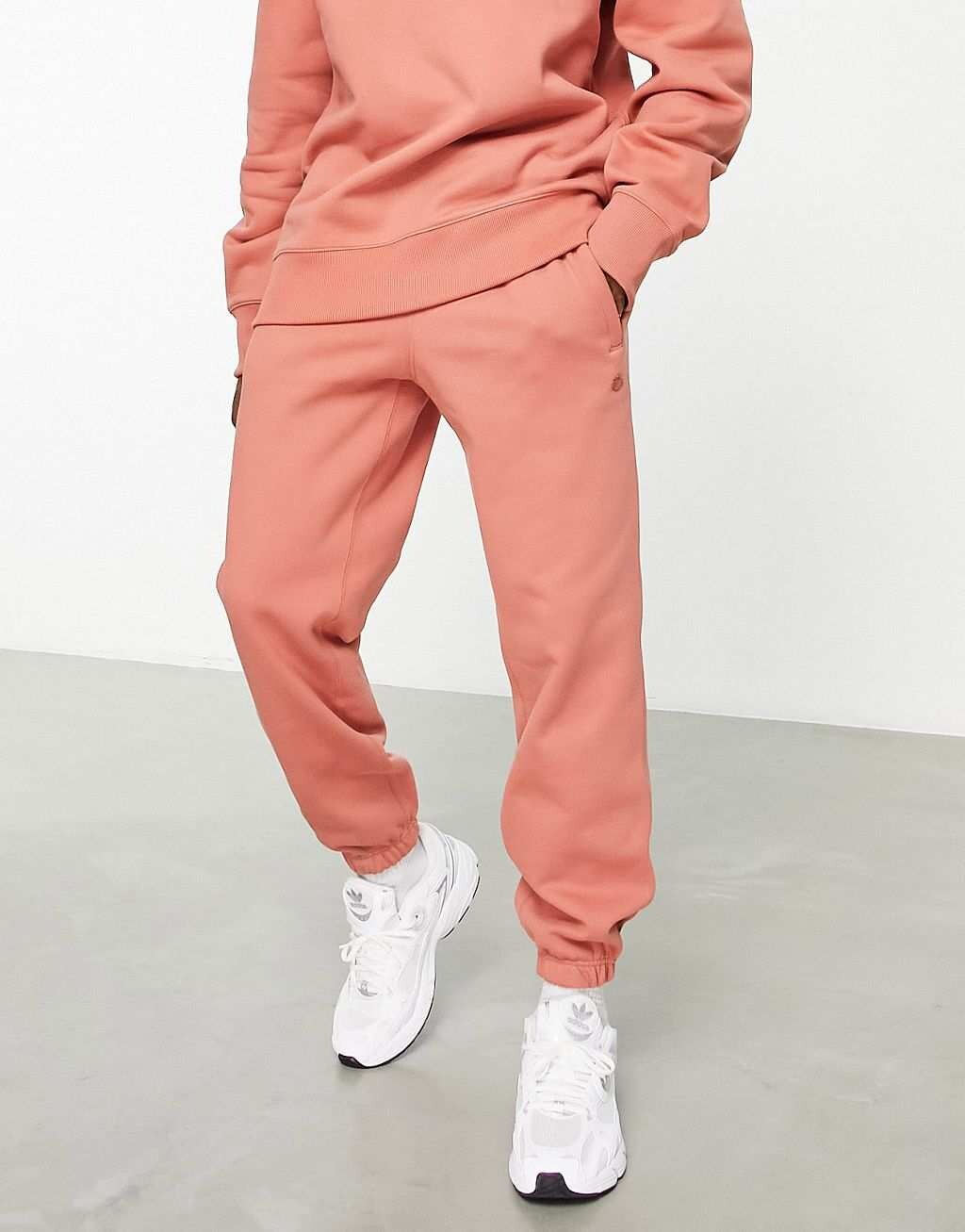

Оранжевые джоггеры с трилистником adidas Originals Contempo