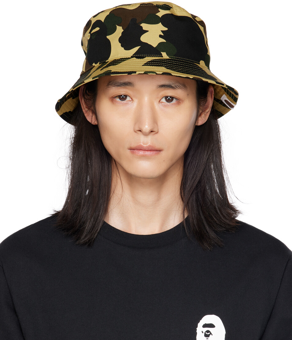 

Желтая панама с камуфляжным принтом 1st BAPE