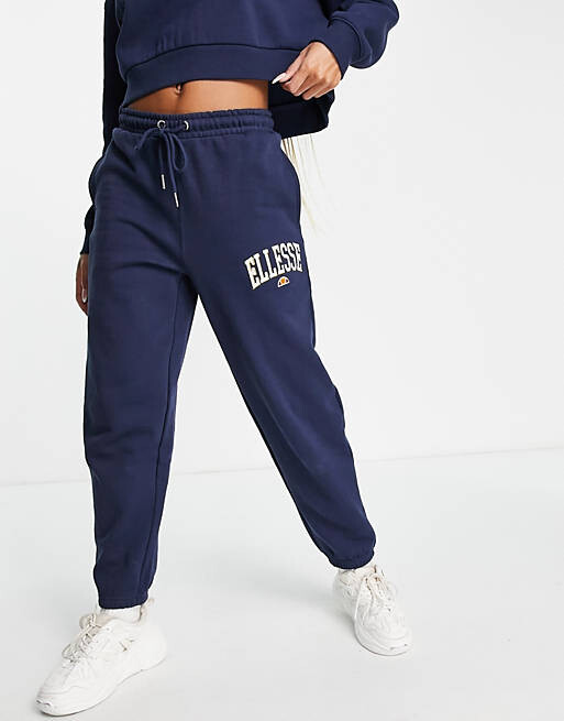 

Темно-синие джоггеры с логотипом ellesse Collegiate