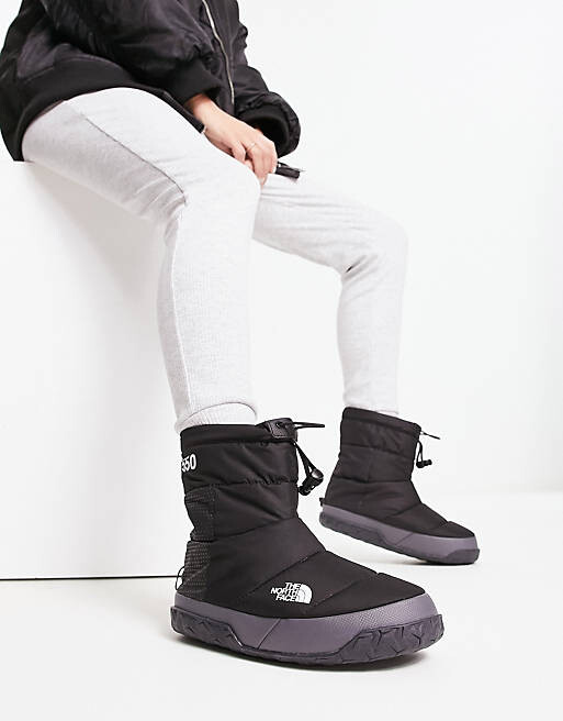 

Черные утепленные ботильоны The North Face Nuptse Apres