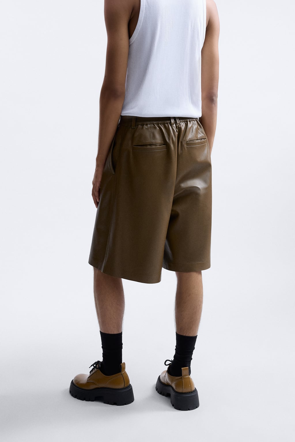 Men in Oversized Bermuda shorts