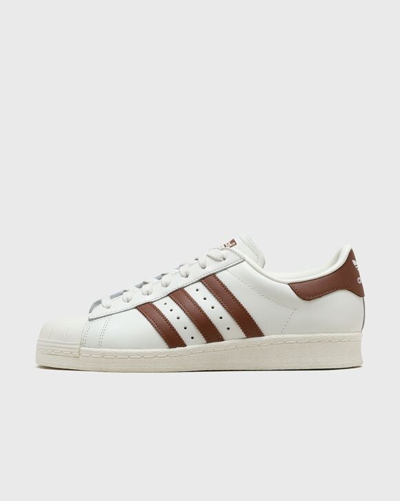 

Кроссовки Adidas Superstar 82, цвет clowhi/prebrn/owhite