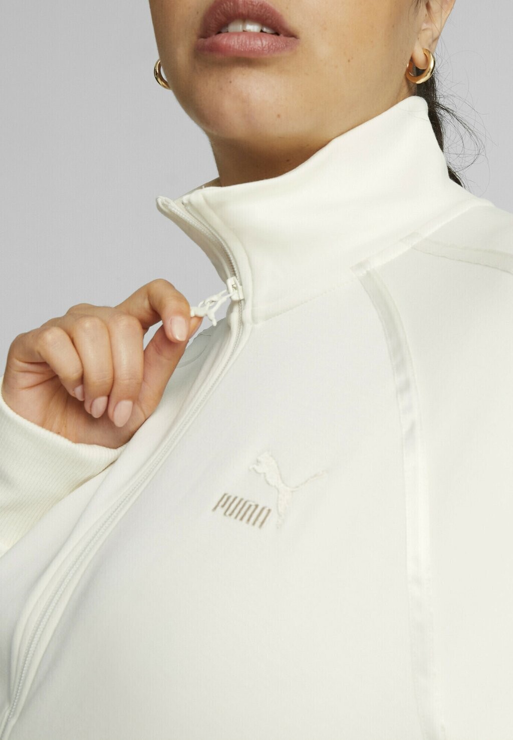 

Спортивная куртка Puma, теплый белый