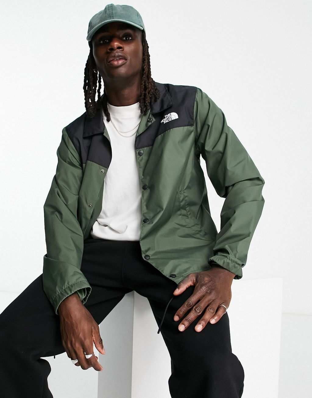 

Водоотталкивающая куртка цвета хаки и черного цвета The North Face эксклюзивно на ASOS