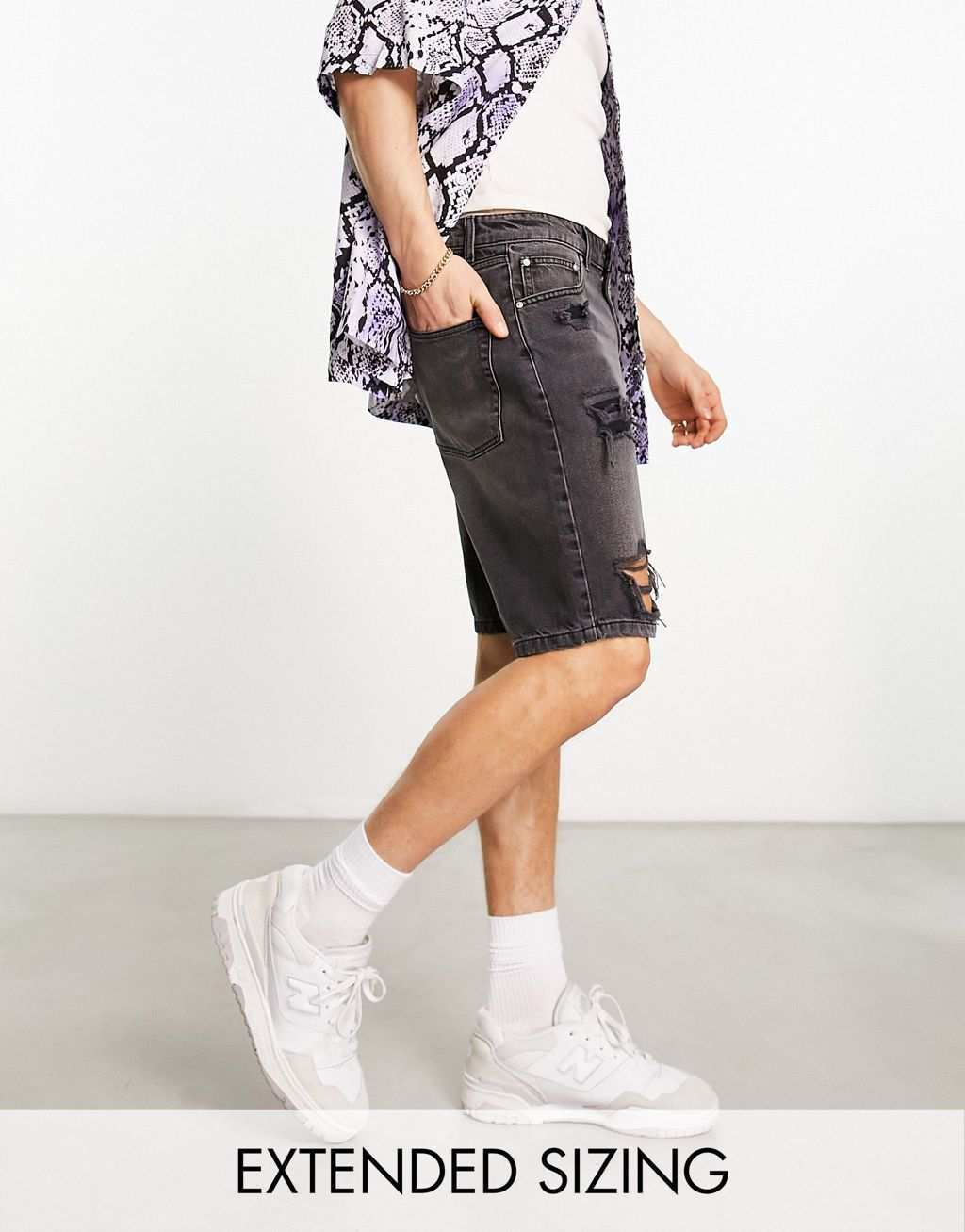 

Черные джинсовые шорты скинни стандартной длины с крупными рвами ASOS DESIGN