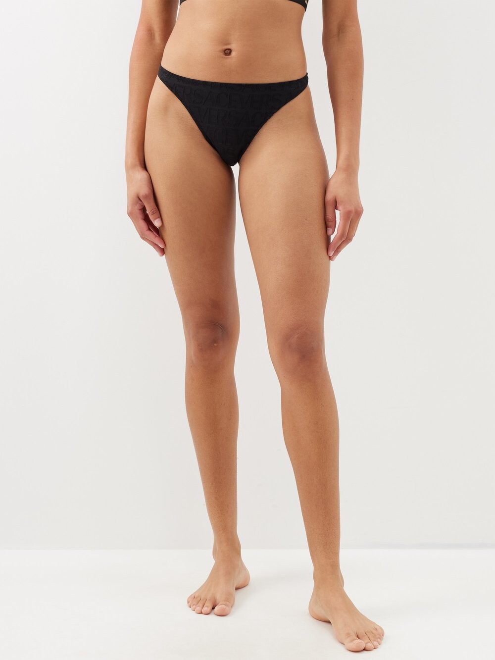 

Стринги из жаккардовой сетки с логотипом Versace, черный