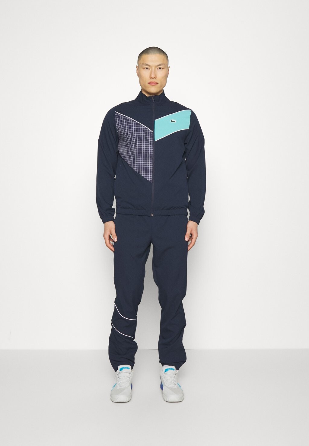 

Спортивный костюм Lacoste
