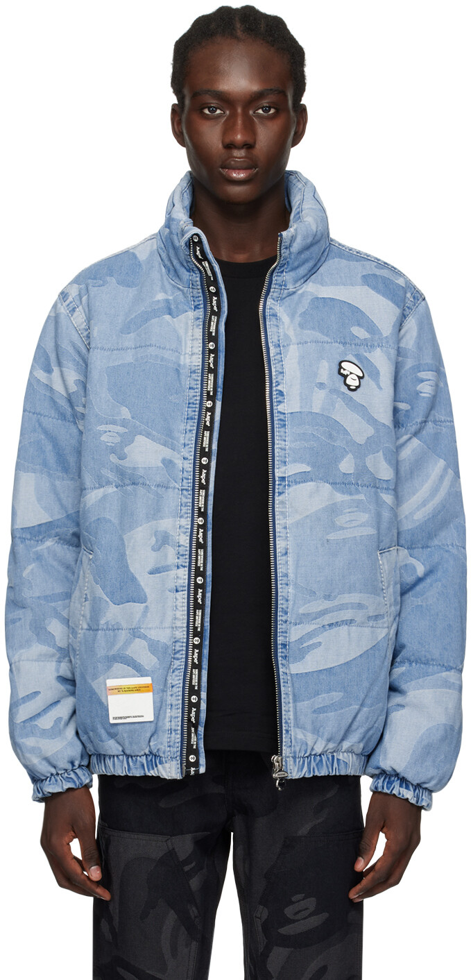 

Синий пуховик с графическим рисунком Aape By A Bathing Ape