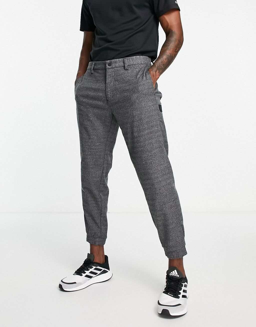 

Серые зауженные брюки в клетку adidas Golf Go-To, Серый