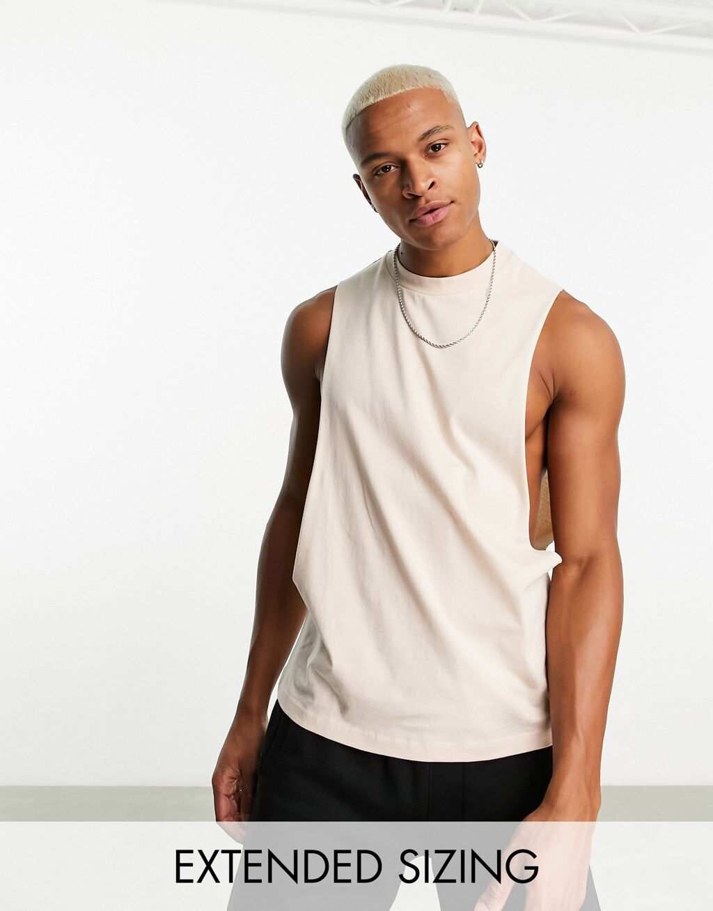 

Бежевый жилет свободного кроя с заниженной проймой ASOS DESIGN