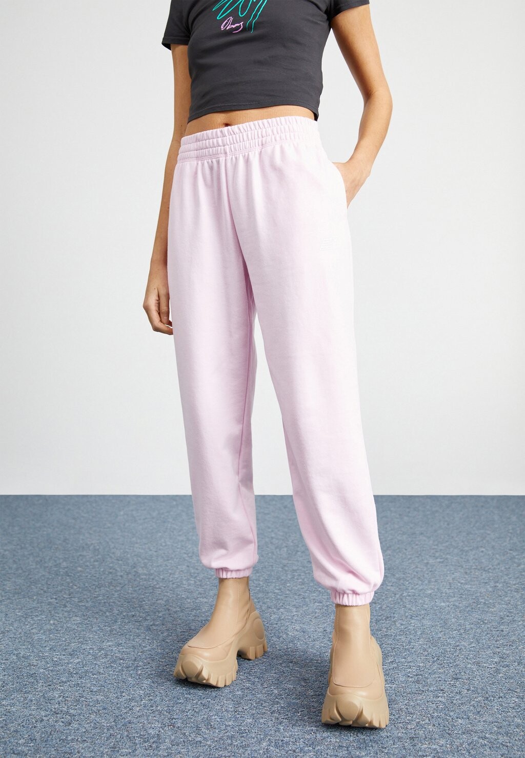 

Спортивные брюки New Balance SPORT FASHION PANT, светлый малиновый