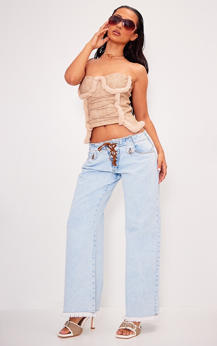 

PrettyLittleThing Голубые джинсы Petite с низкой посадкой и широкими штанинами на шнуровке
