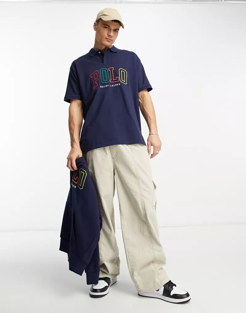 

Polo Ralph Lauren – рубашка-поло из пике темно-синего цвета с большим ярким логотипом и объемным кроем
