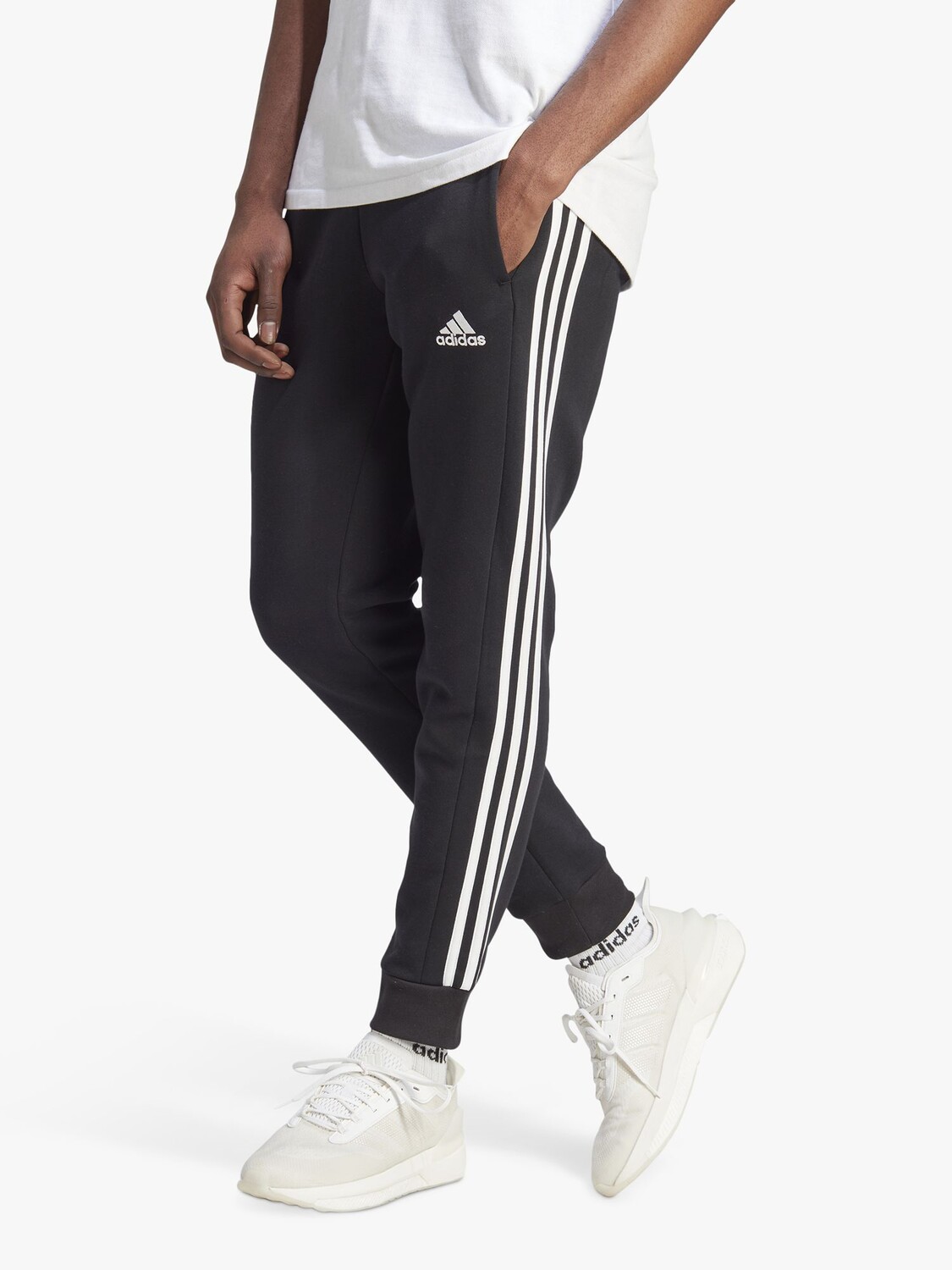 

Adidas Essentials Флисовые джоггеры с 3 полосками и зауженными манжетами, черный/белый