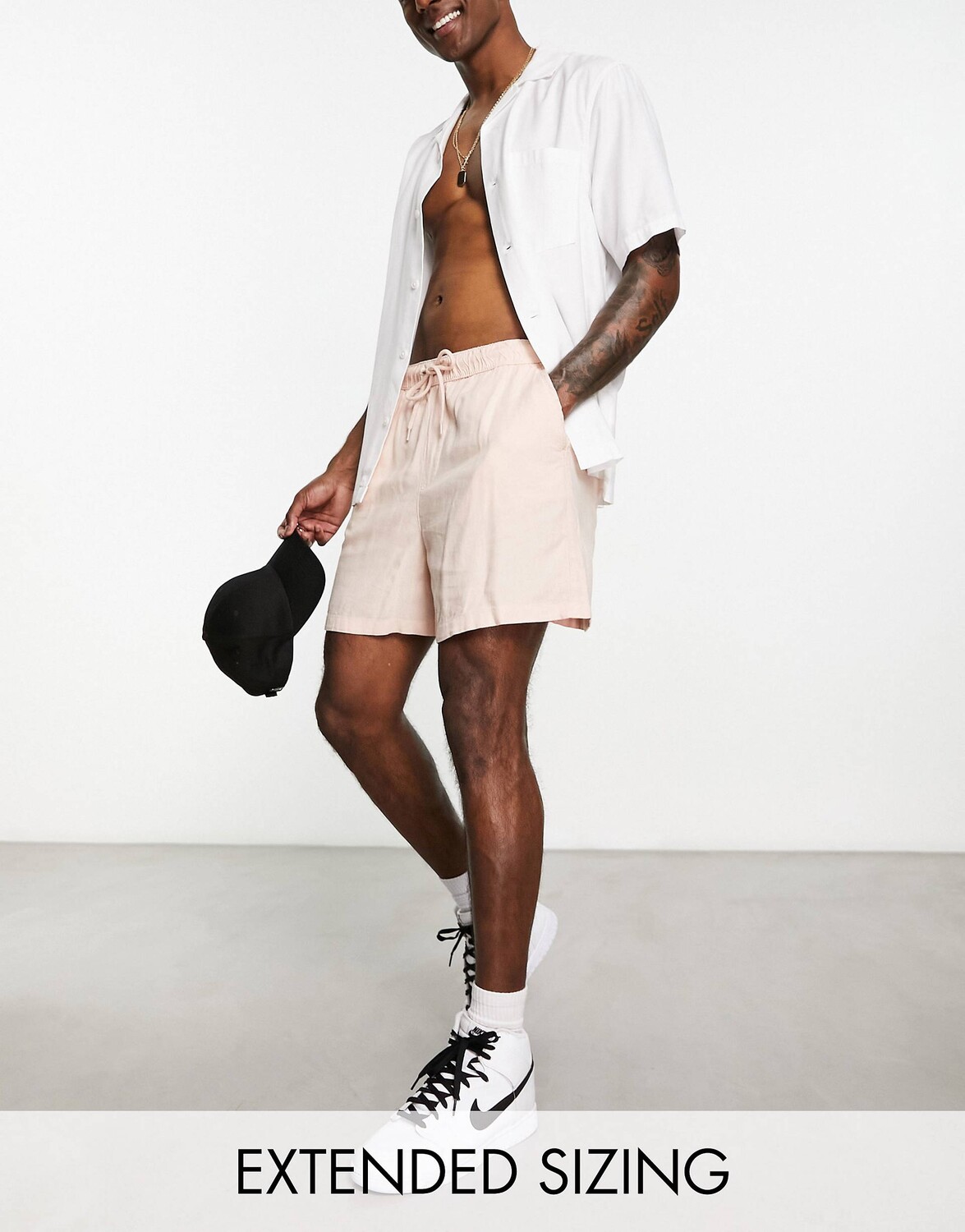 

Укороченные широкие льняные шорты розового цвета ASOS DESIGN