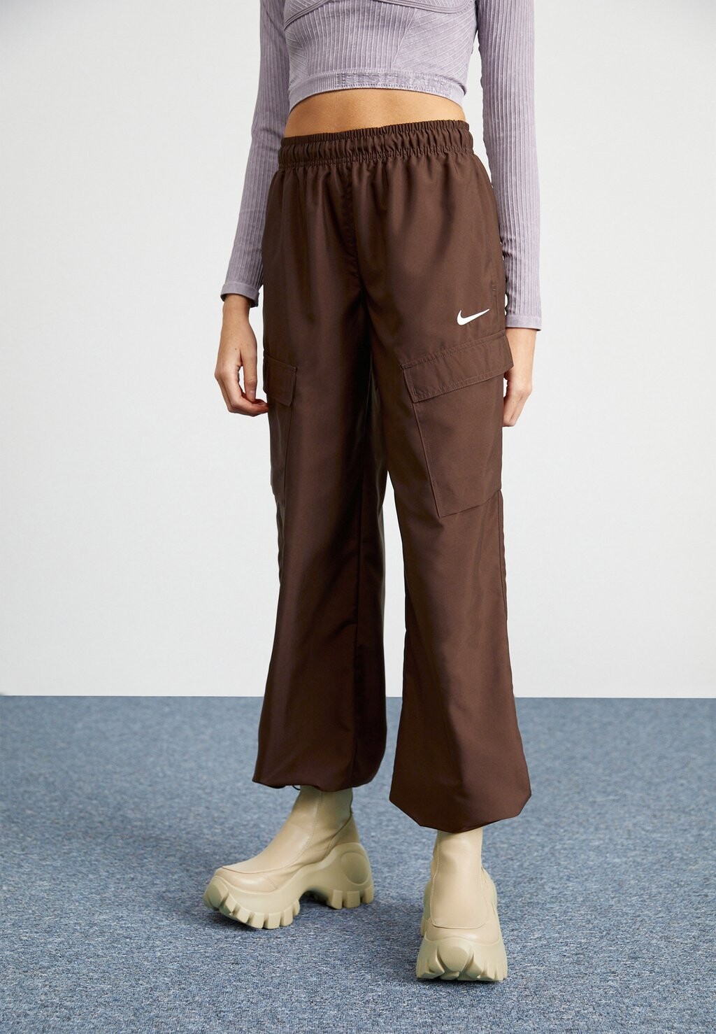 

Тренировочные брюки Nike Sportswear, коричневый