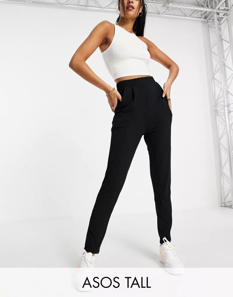 

Черные трикотажные брюки-морковки ASOS DESIGN Curve Ultimate