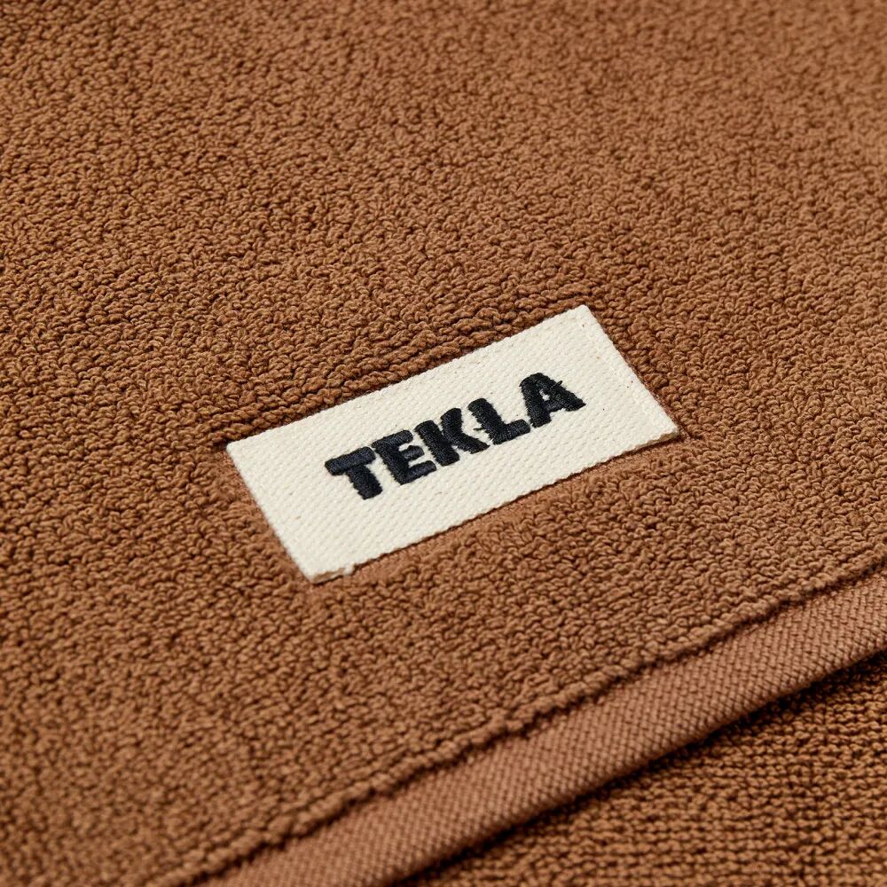 цена Tekla Fabrics Органический махровый коврик для ванной, коричневый