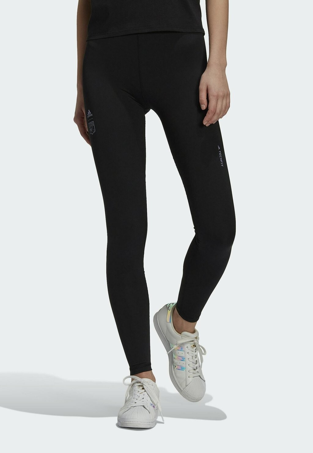 

Тайтсы Adidas, черный