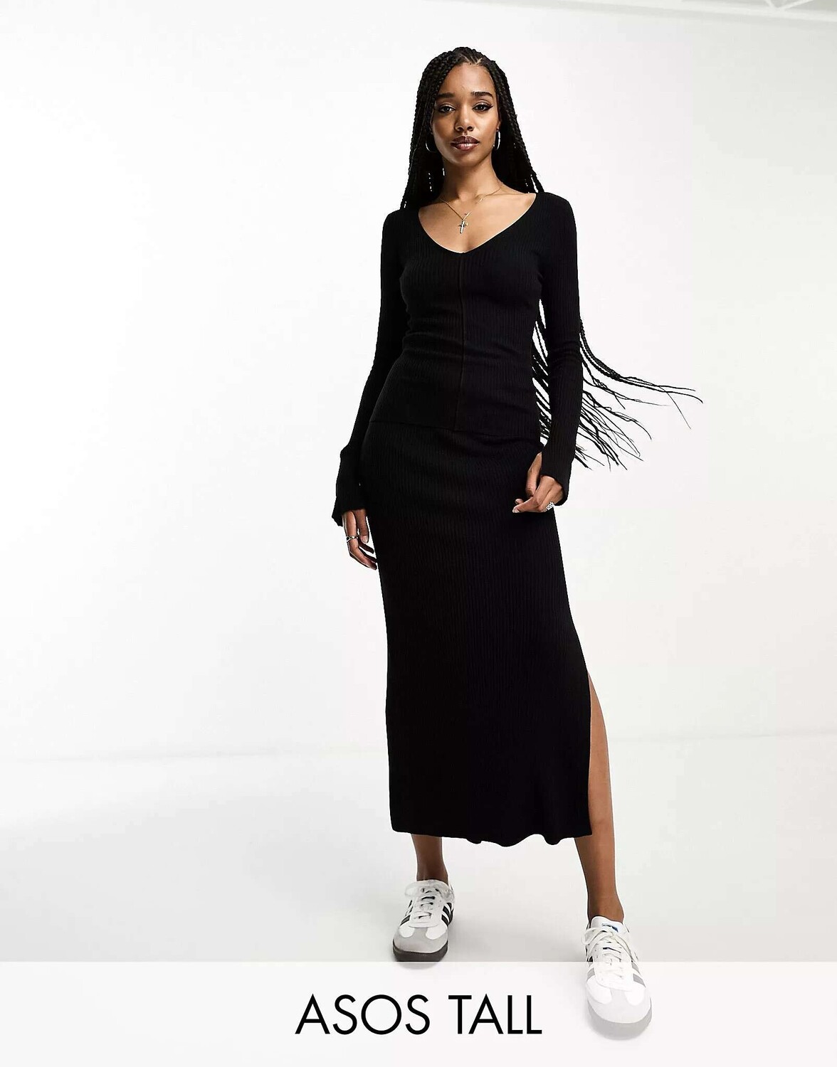 

Черная трикотажная юбка миди в рубчик ASOS DESIGN Tall