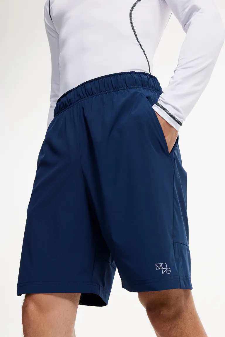 

Спортивные шорты drymove, растягивающиеся в четырех направлениях H&M, синий