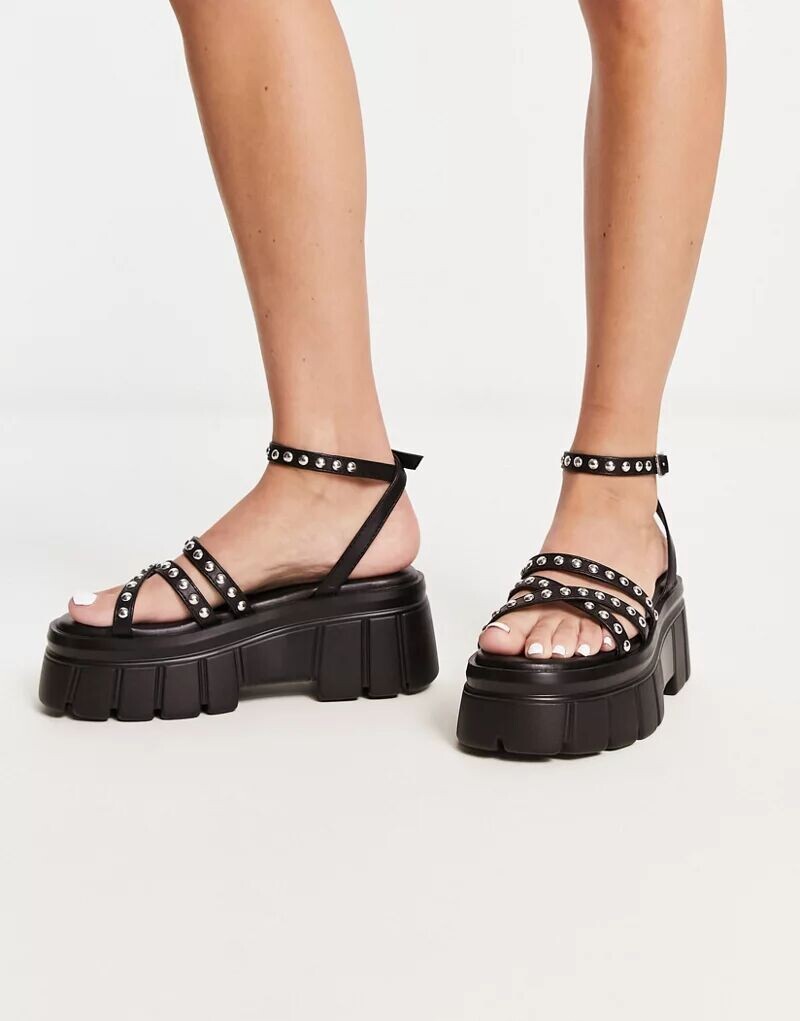 

Черные сандалии на плоской платформе с массивными шипами ASOS Tyson