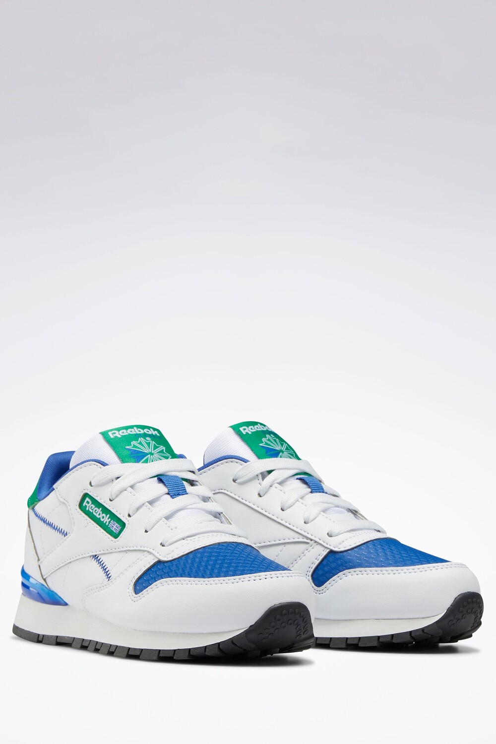 

Бело-синяя детская спортивная обувь Classic Step 'n' Flash Reebok, синий