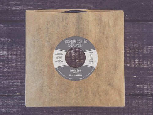 

Сингл 7" Ikebe Shakedown: Curitiba Strut / Monophonics / Hanging On