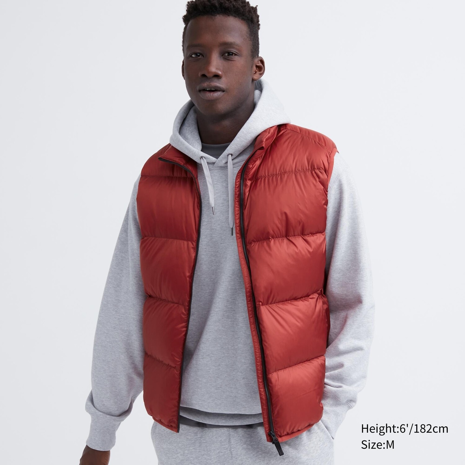 

Ультралегкий пуховый жилет Uniqlo, красный