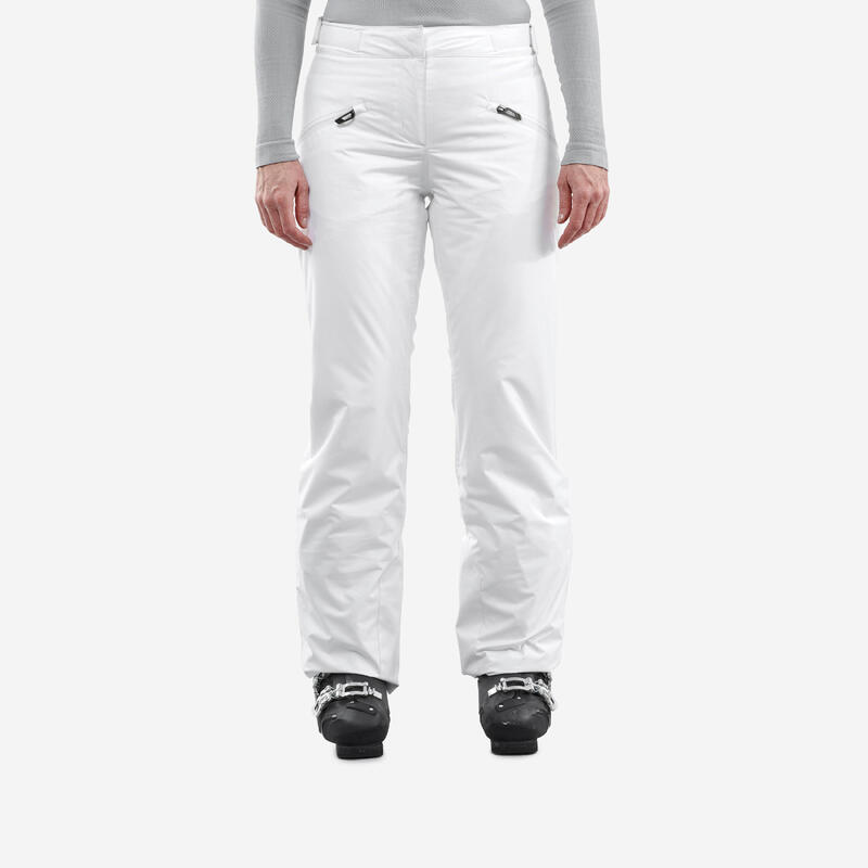 цена Лыжные брюки женские трассовые теплые - 180 белый WEDZE, цвет weiss