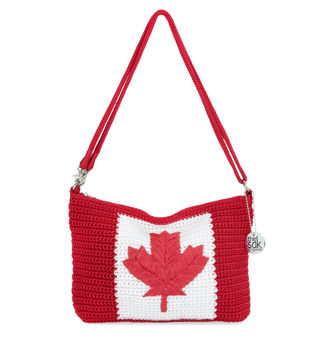 

Люми через плечо The Sak, цвет Hand Crochet - Canadian Flag
