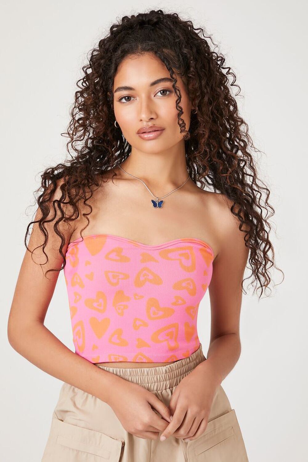 

Бесшовный топ-труба с принтом в виде сердечек Forever 21, розовый