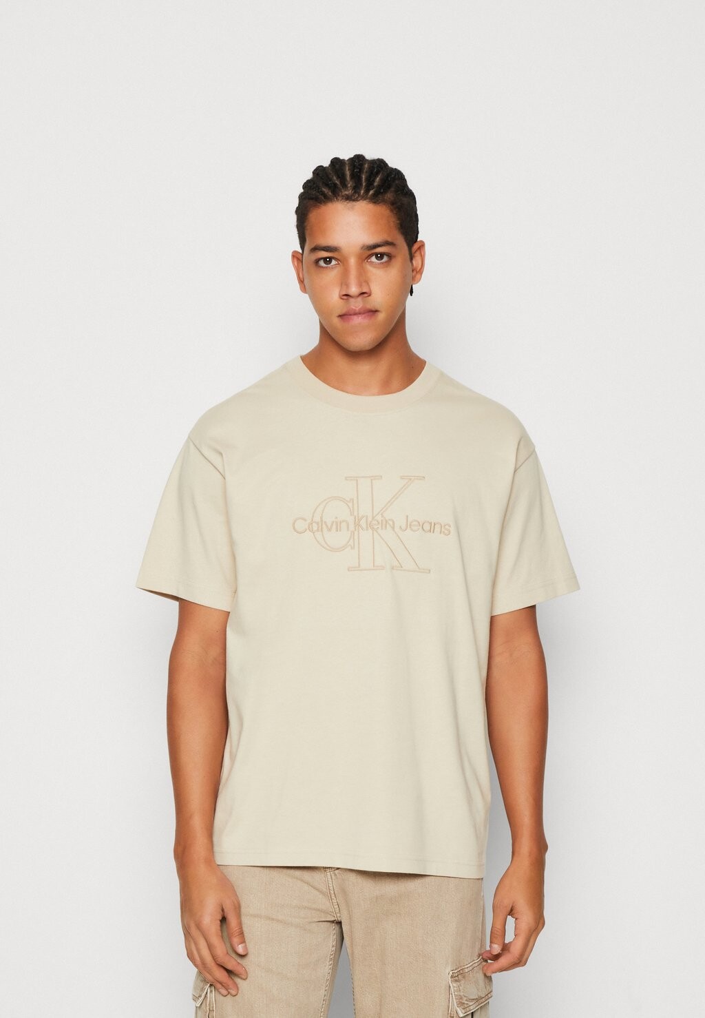 

Футболка с принтом Calvin Klein Jeans, бежевый
