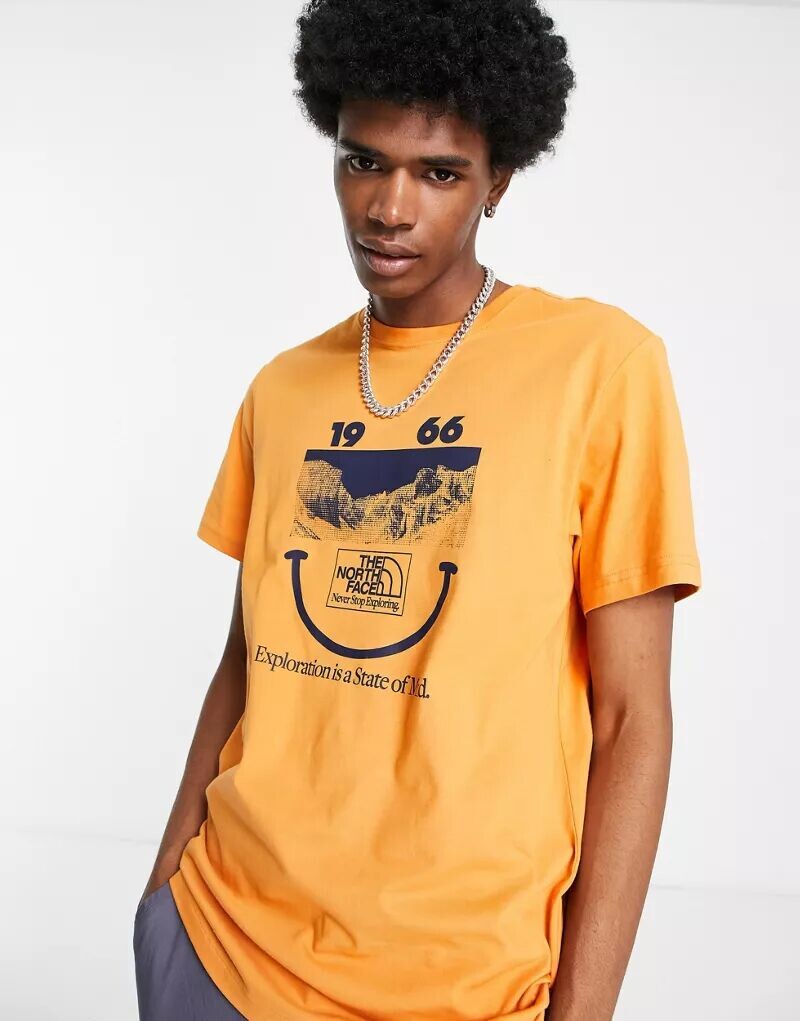 

Оранжевая футболка The North Face 1966 Smile Face эксклюзивно на ASOS