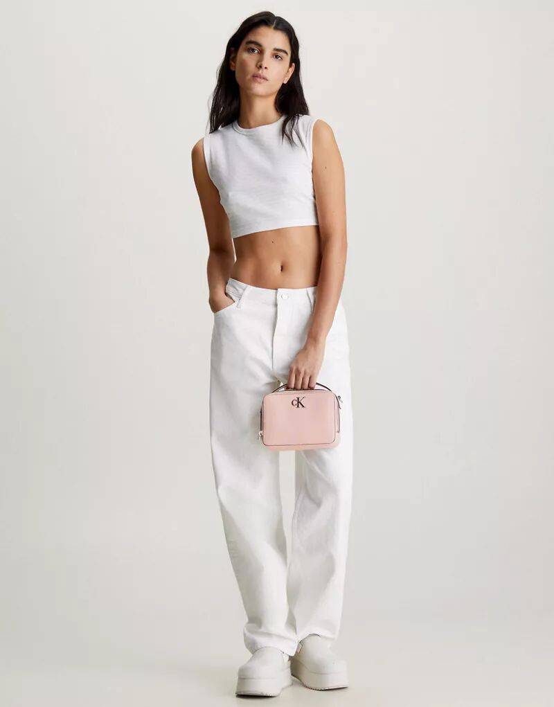Бледно-розовая сумка через плечо Calvin Klein цена и фото