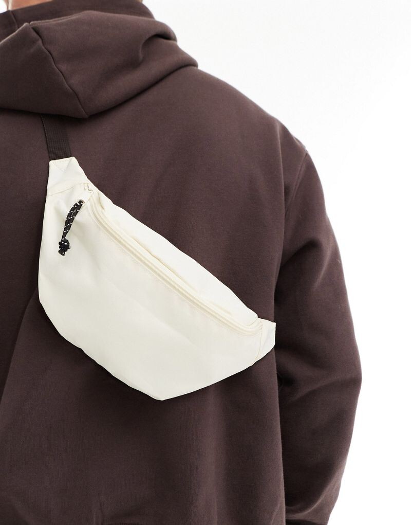 

Поясная сумка через плечо ASOS DESIGN на шнуровке-молнии цвета экрю
