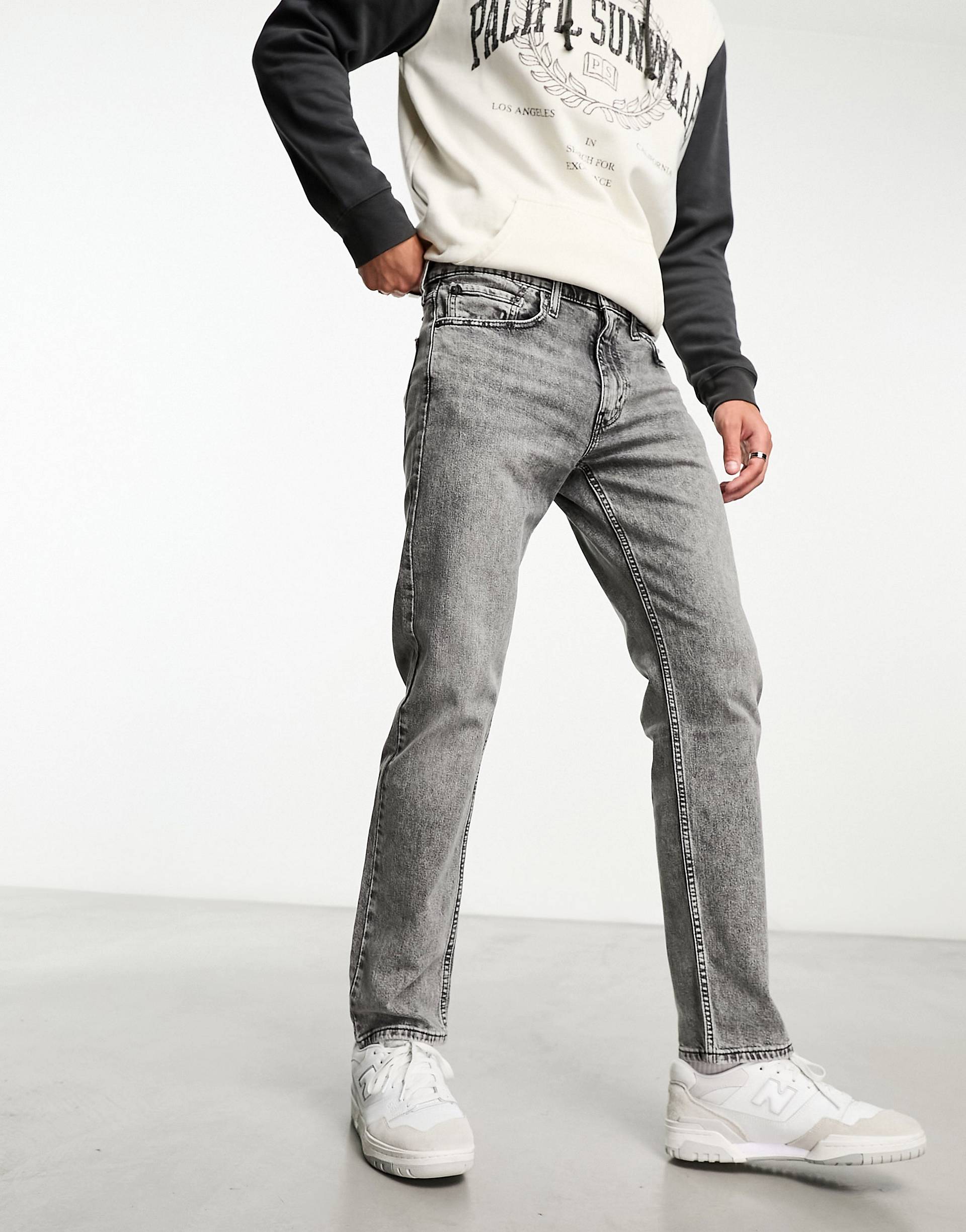 Светло-серые джинсы зауженного кроя Levi's 502 цена и фото