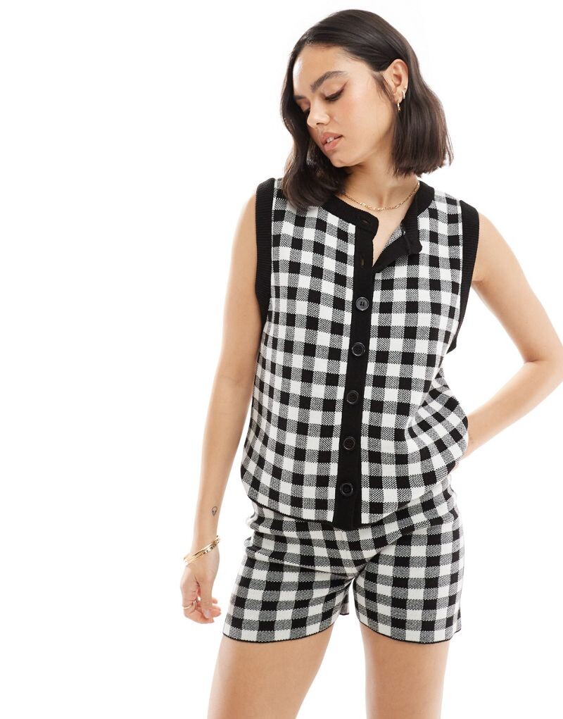 

Черный комбинезон в мелкую клетку оверсайз ASOS DESIGN