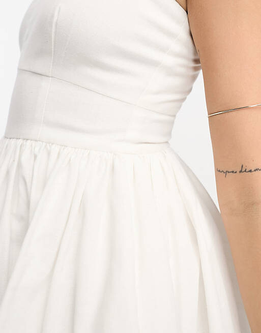 

Белый комбинезон с юбкой и бретельками ASOS DESIGN
