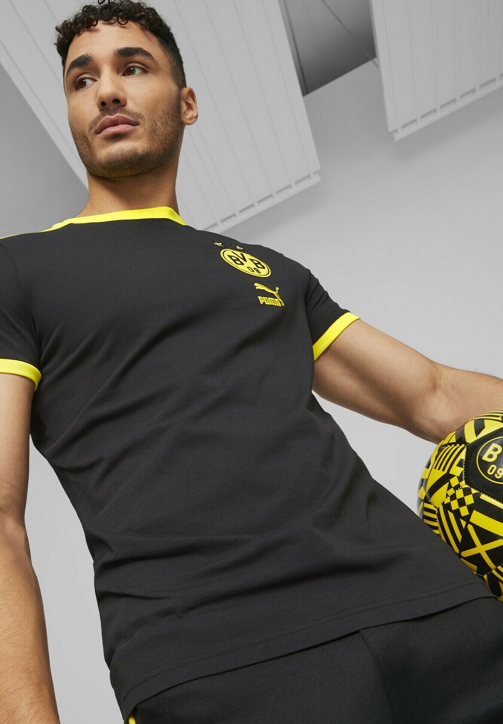 

Футболка с символикой BVB BORUSSIA DORTMUND FTBLHERITAGE TEE Puma, цвет black