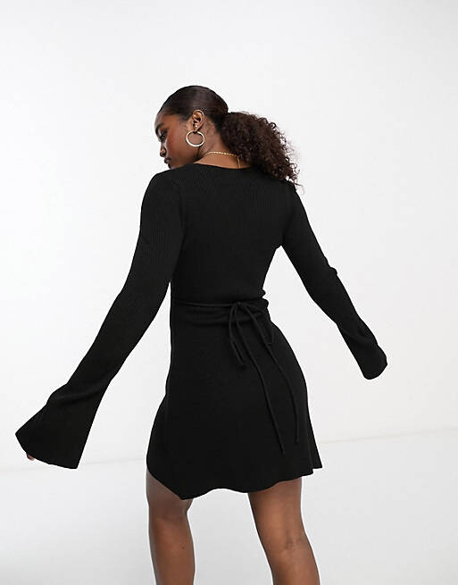 

Черное трикотажное расклешенное платье с запахом и запахом ASOS DESIGN