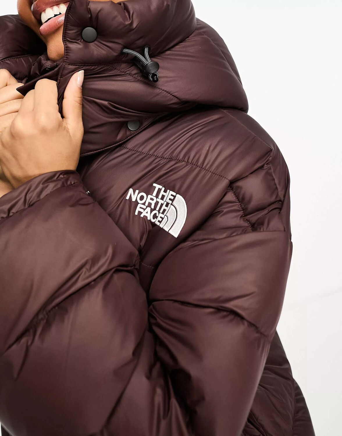 

Коричневый длинный пуховик оверсайз The North Face Acamarachi