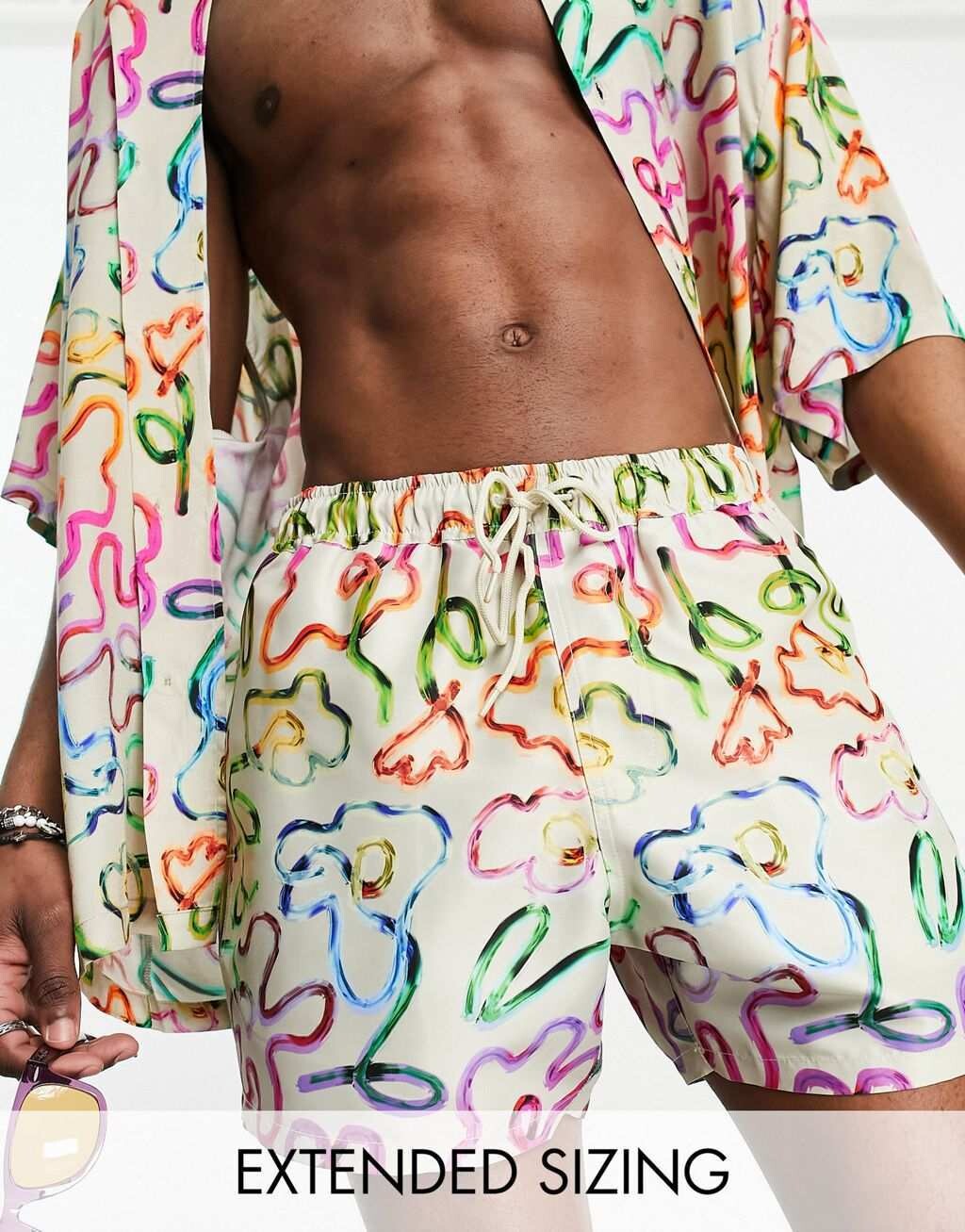 

Короткие шорты для плавания с цветочным принтом ASOS DESIGN