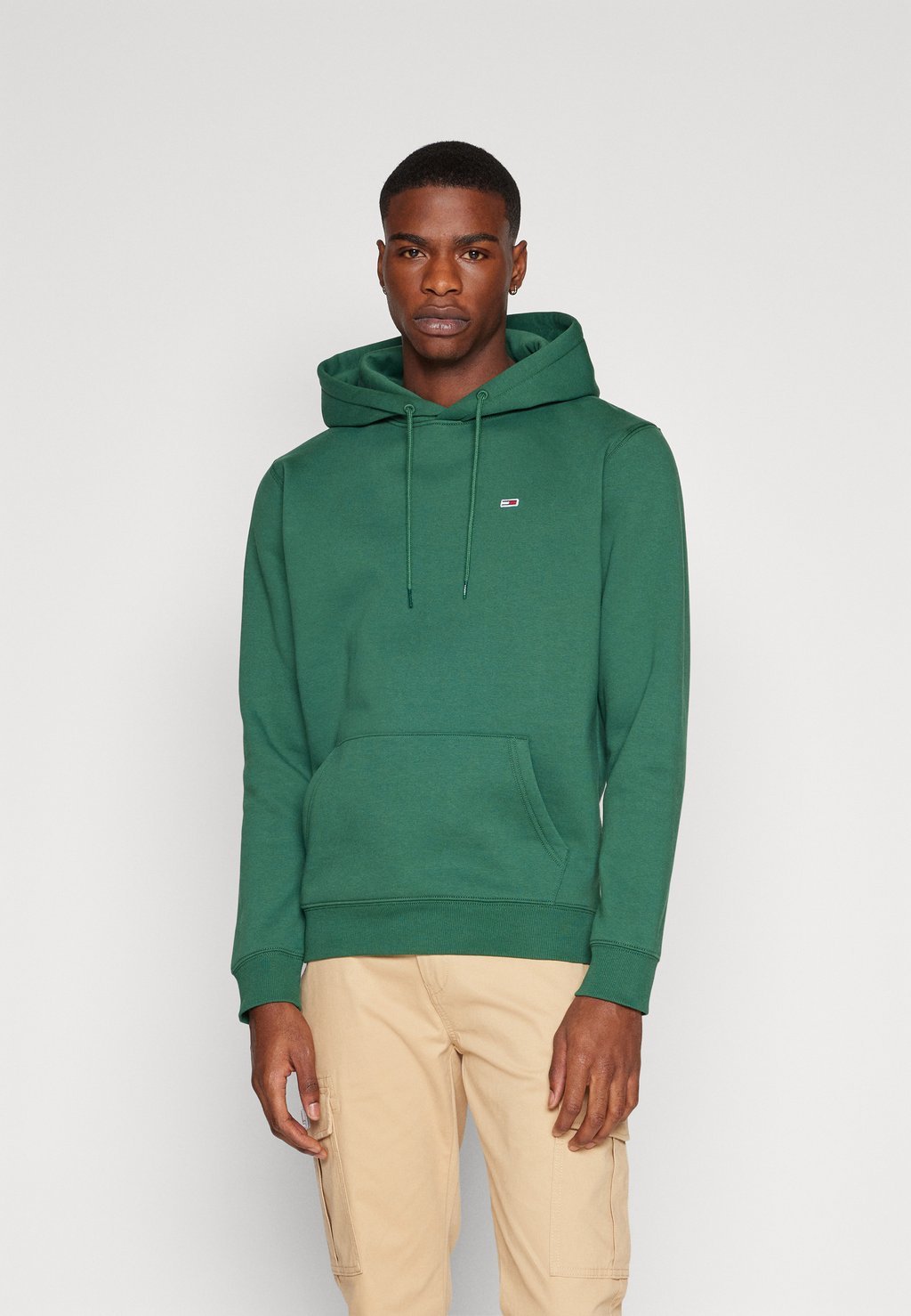 

Толстовка Tommy Jeans REGULAR HOODIE UNISEX, темно-зеленый