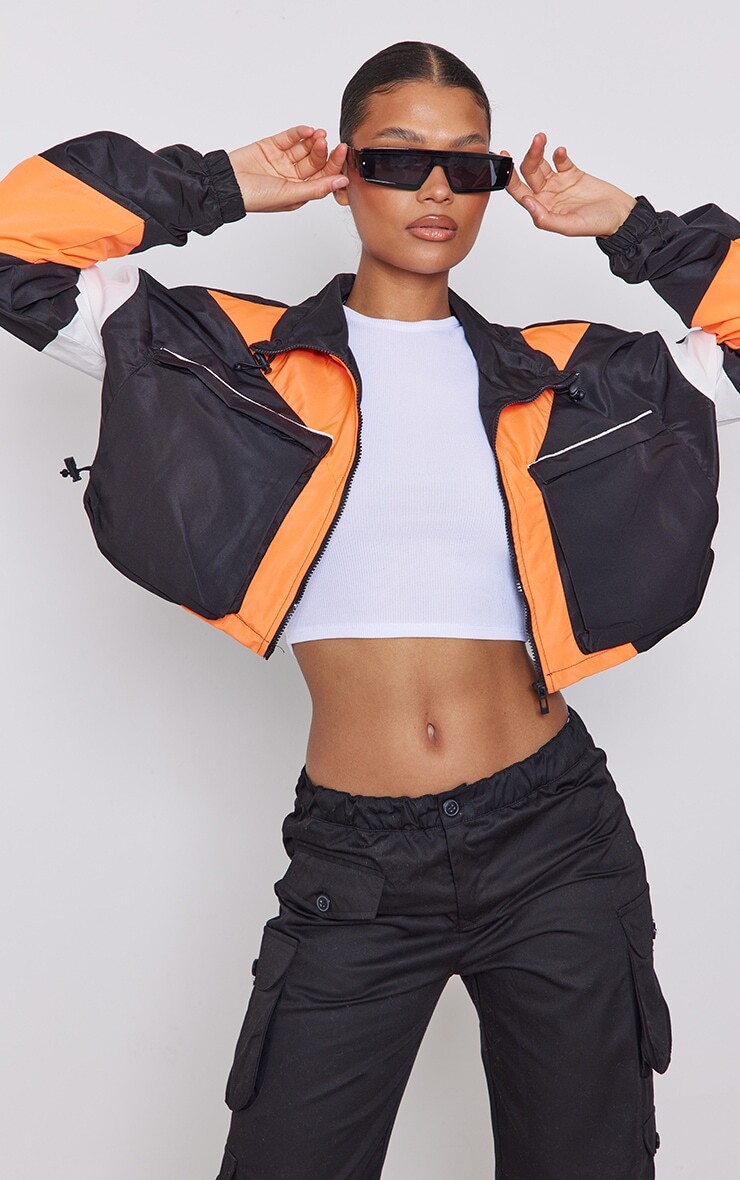 

PrettyLittleThing Оранжевая куртка с карманами спереди и контрастной вставкой