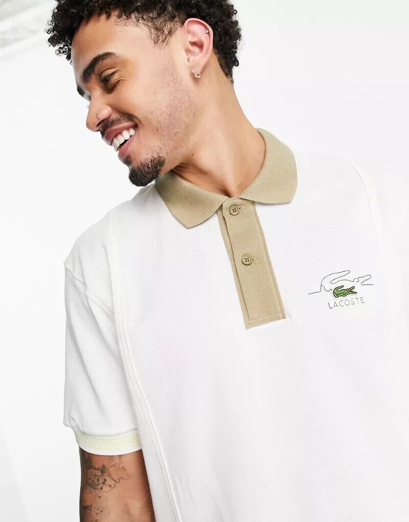 

Белая рубашка-поло классического кроя Lacoste с контрастными полосками